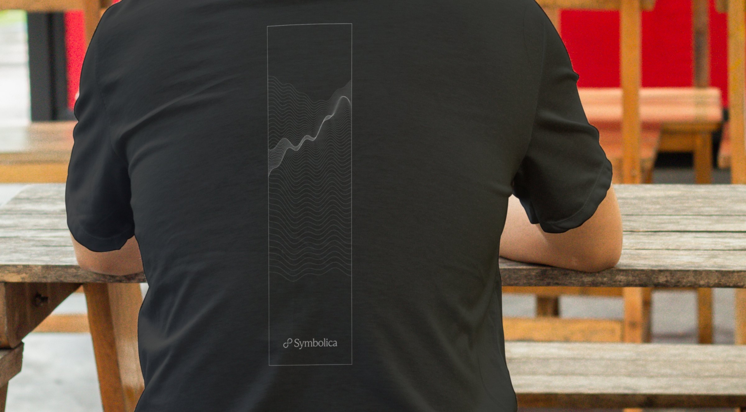 Symbolica tee worn outdoors
